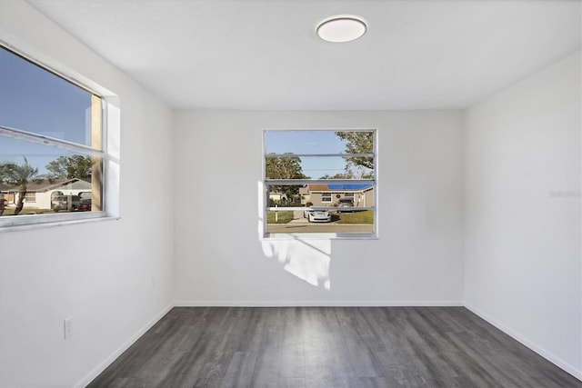 1032 Elaine St, Venice, FL 34285 - spare room with wood finished floors and baseboards
