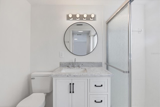 1032 Elaine St, Venice, FL 34285 - bathroom with toilet, vanity, and a shower stall