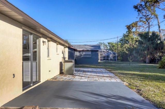 1032 Elaine St, Venice, FL 34285 - view of patio / terrace featuring central AC unit