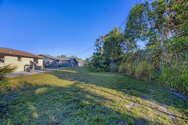 1032 Elaine St, Venice, FL 34285 - view of grassy yard with central air condition unit