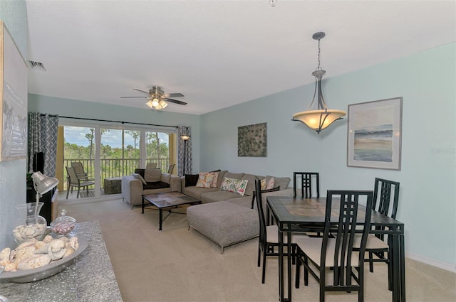 8409 Placida Rd Unit 206, Placida, FL 33946 - living area featuring light carpet and a ceiling fan