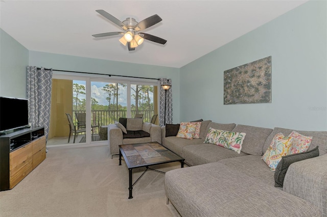 8409 Placida Rd Unit 206, Placida, FL 33946 - living room featuring a ceiling fan and light carpet