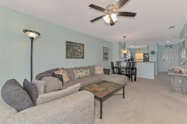 8409 Placida Rd Unit 206, Placida, FL 33946 - living area with ceiling fan, light carpet, and recessed lighting