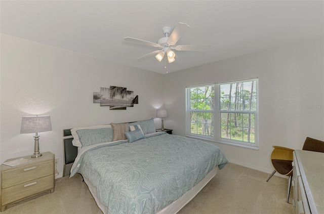 8409 Placida Rd Unit 206, Placida, FL 33946 - bedroom featuring light colored carpet, baseboards, and ceiling fan