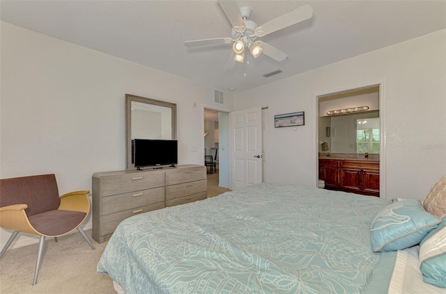 8409 Placida Rd Unit 206, Placida, FL 33946 - bedroom featuring carpet, a ceiling fan, and ensuite bathroom