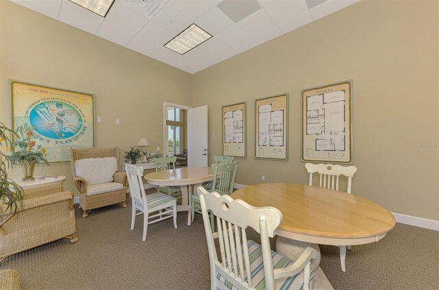 8409 Placida Rd Unit 206, Placida, FL 33946 - carpeted dining space with baseboards