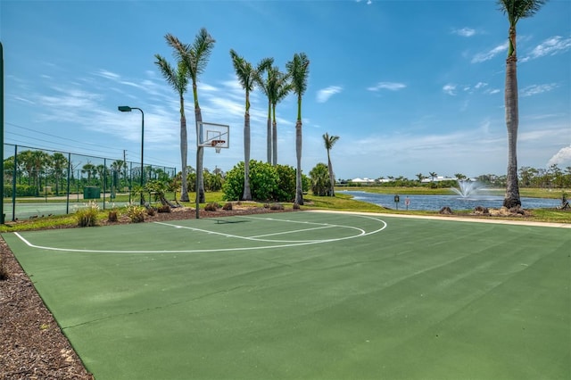 8409 Placida Rd Unit 206, Placida, FL 33946 - view of sport court featuring community basketball court and a water view