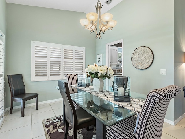114 Southampton Pl N Unit 237, Venice, FL 34293 - tiled dining area with a high ceiling, a chandelier, and baseboards