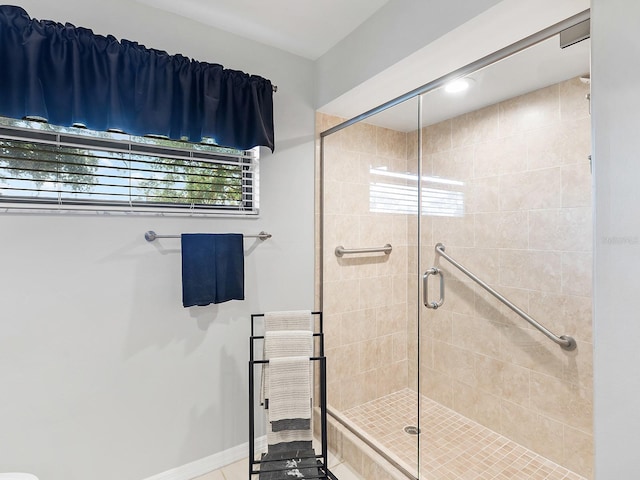 114 Southampton Pl N Unit 237, Venice, FL 34293 - bathroom with a shower stall and baseboards
