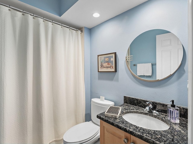 114 Southampton Pl N Unit 237, Venice, FL 34293 - bathroom with toilet, vanity, and a shower with shower curtain