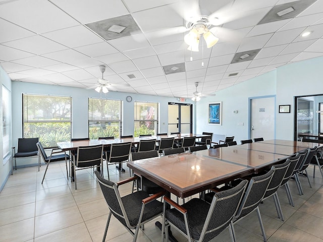 114 Southampton Pl N Unit 237, Venice, FL 34293 - dining area featuring a ceiling fan, a drop ceiling, and light tile patterned floors