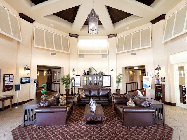 114 Southampton Pl N Unit 237, Venice, FL 34293 - common area featuring a high ceiling, coffered ceiling, and beamed ceiling