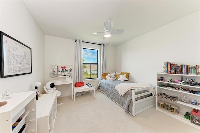 12816 Morning Mist Pl, Venice, FL 34293 - bedroom with light colored carpet and ceiling fan