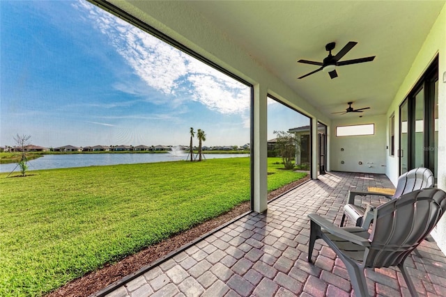12816 Morning Mist Pl, Venice, FL 34293 - view of patio / terrace featuring a water view and a ceiling fan