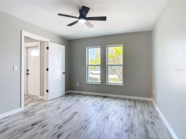 7140 Teaberry St, Englewood, FL 34224 - spare room featuring light wood finished floors, baseboards, and a ceiling fan