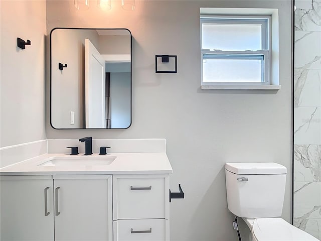 7140 Teaberry St, Englewood, FL 34224 - full bath featuring vanity, toilet, and a marble finish shower
