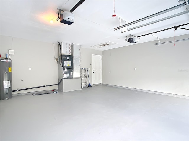 7140 Teaberry St, Englewood, FL 34224 - garage featuring electric water heater, a garage door opener, and heating unit
