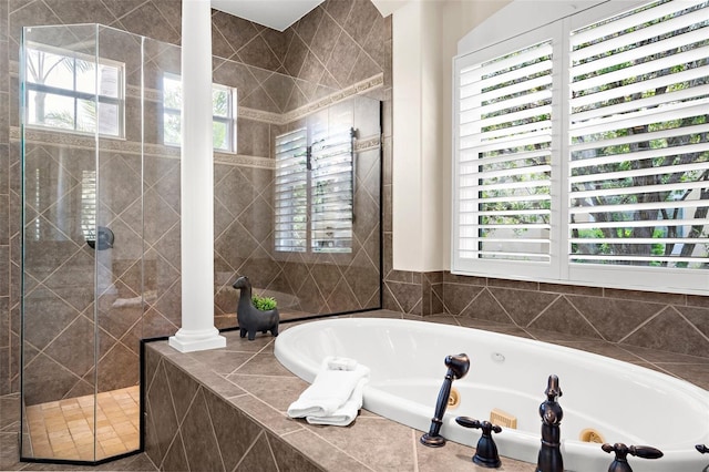 186 Portofino Dr, Nokomis, FL 34275 - bathroom with plenty of natural light, a whirlpool tub, and a stall shower