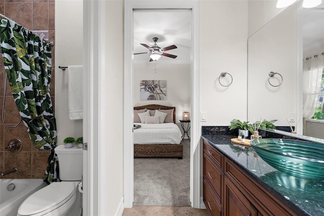 186 Portofino Dr, Nokomis, FL 34275 - ensuite bathroom with vanity, a ceiling fan, toilet, shower / tub combo, and tile patterned floors
