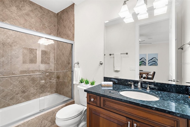 186 Portofino Dr, Nokomis, FL 34275 - full bathroom featuring tiled shower / bath, vanity, and toilet
