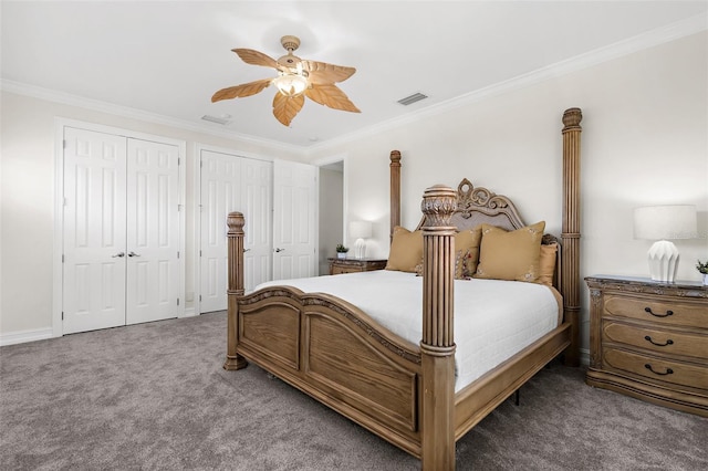 186 Portofino Dr, Nokomis, FL 34275 - carpeted bedroom featuring crown molding, two closets, ceiling fan, and baseboards