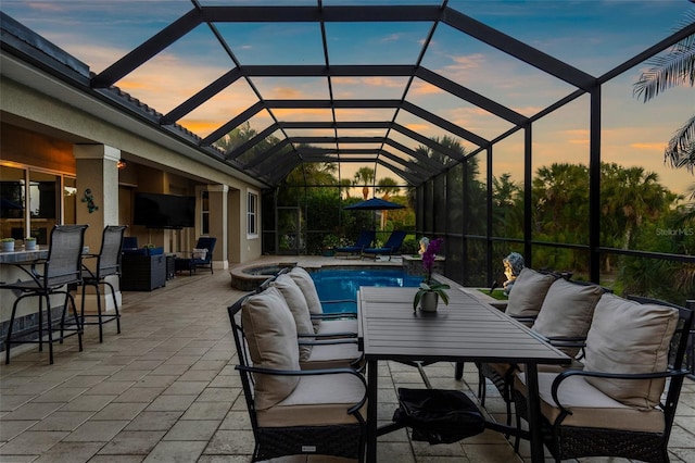 186 Portofino Dr, Nokomis, FL 34275 - view of patio / terrace featuring an outdoor pool, an outdoor hot tub, outdoor lounge area, outdoor dining area, and glass enclosure