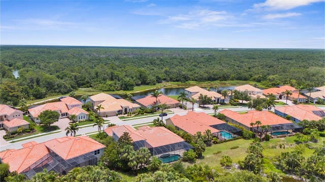 186 Portofino Dr, Nokomis, FL 34275 - aerial view of residential area featuring a forest and a nearby body of water
