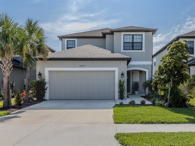 15364 Isla Palma Ln, Nokomis, FL 34275 - traditional-style home featuring stucco siding, a garage, driveway, and a shingled roof