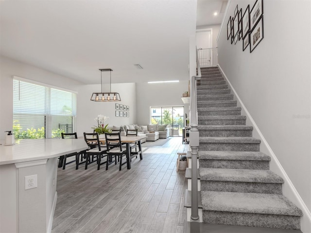 15364 Isla Palma Ln, Nokomis, FL 34275 - stairway featuring wood finished floors