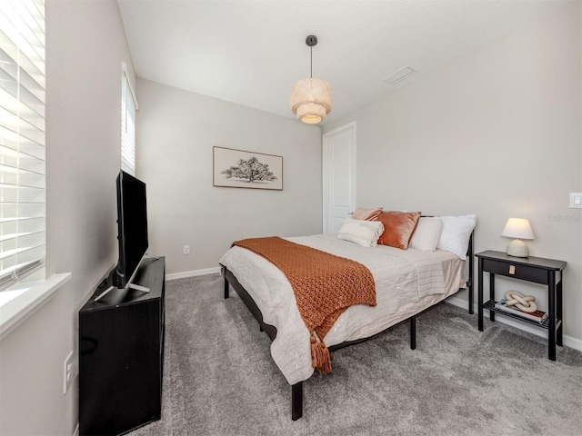 15364 Isla Palma Ln, Nokomis, FL 34275 - carpeted bedroom featuring baseboards