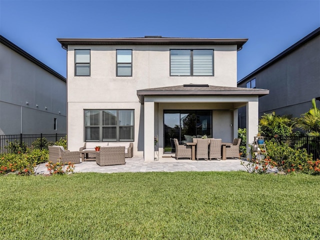 15364 Isla Palma Ln, Nokomis, FL 34275 - back of house featuring outdoor lounge area, a patio area, and stucco siding