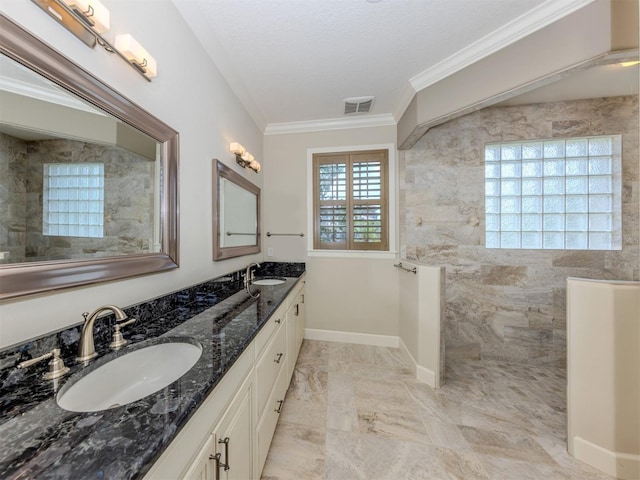 333 Sunrise Dr, Nokomis, FL 34275 - bathroom with double vanity, marble finish flooring, a walk in shower, ornamental molding, and baseboards