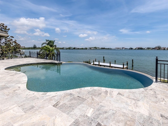 333 Sunrise Dr, Nokomis, FL 34275 - swimming pool with a patio, a water view, and a boat dock