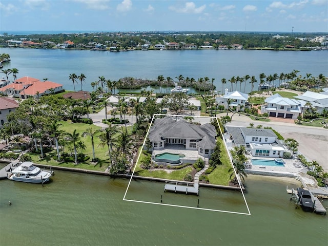 333 Sunrise Dr, Nokomis, FL 34275 - aerial view of residential area featuring a pool area, a large body of water, and property parcel outlined