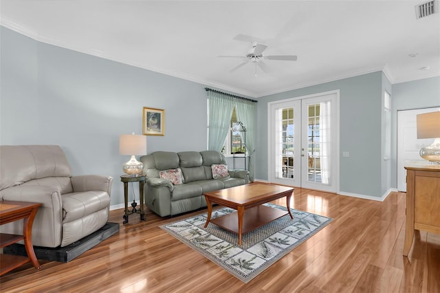 4378 Summertree Rd, Venice, FL 34293 - living area featuring french doors, a ceiling fan, baseboards, crown molding, and light wood-type flooring