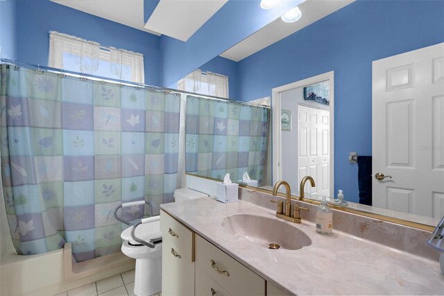 4378 Summertree Rd, Venice, FL 34293 - full bath with vanity, toilet, shower / bath combo with shower curtain, and tile patterned flooring