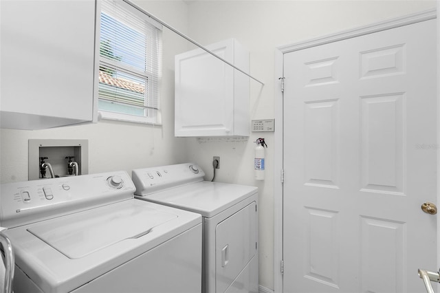 4378 Summertree Rd, Venice, FL 34293 - laundry room featuring cabinet space and separate washer and dryer