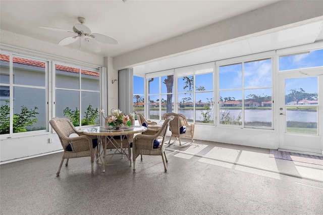 4378 Summertree Rd, Venice, FL 34293 - sunroom / solarium featuring a water view and speckle patterned floor