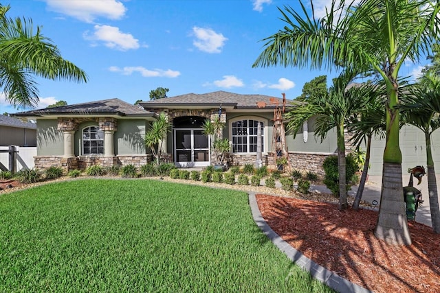 2769 Dode Ave, North Port, FL 34288 - ranch-style house featuring stone siding and stucco siding