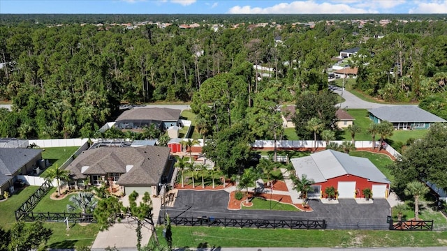 2769 Dode Ave, North Port, FL 34288 - aerial view of residential area featuring a heavily wooded area