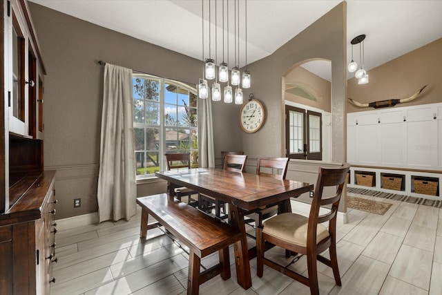 2769 Dode Ave, North Port, FL 34288 - dining room with arched walkways and baseboards