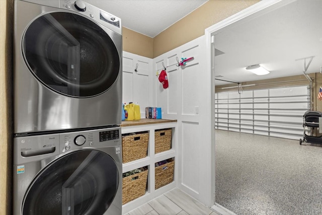 2769 Dode Ave, North Port, FL 34288 - washroom featuring stacked washing machine and dryer