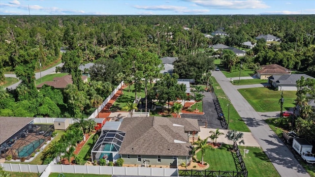2769 Dode Ave, North Port, FL 34288 - aerial perspective of suburban area featuring a forest
