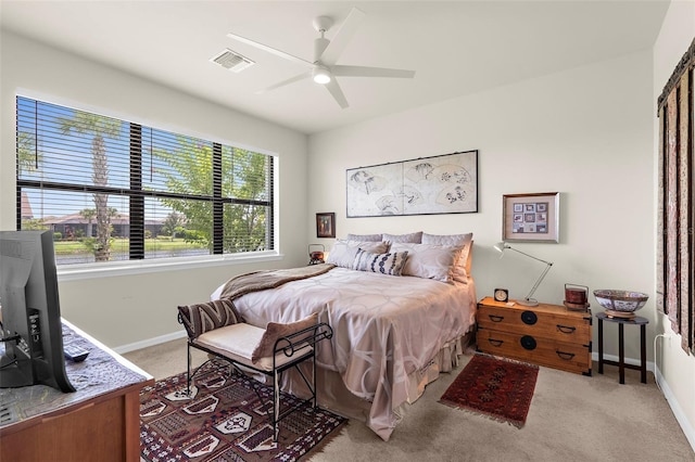 13486 Nobilio St, Venice, FL 34293 - bedroom with light colored carpet and a ceiling fan