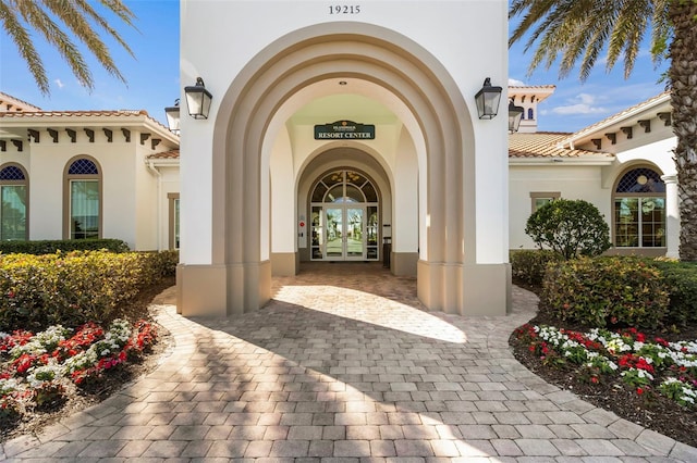 13486 Nobilio St, Venice, FL 34293 - entrance to property with french doors and stucco siding