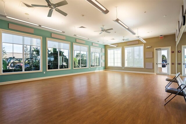 13486 Nobilio St, Venice, FL 34293 - exercise room with a ceiling fan and wood finished floors