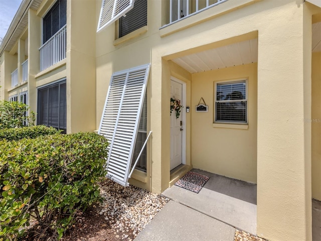 418 Cerromar Ct Unit 158, Venice, FL 34293 - property entrance featuring stucco siding