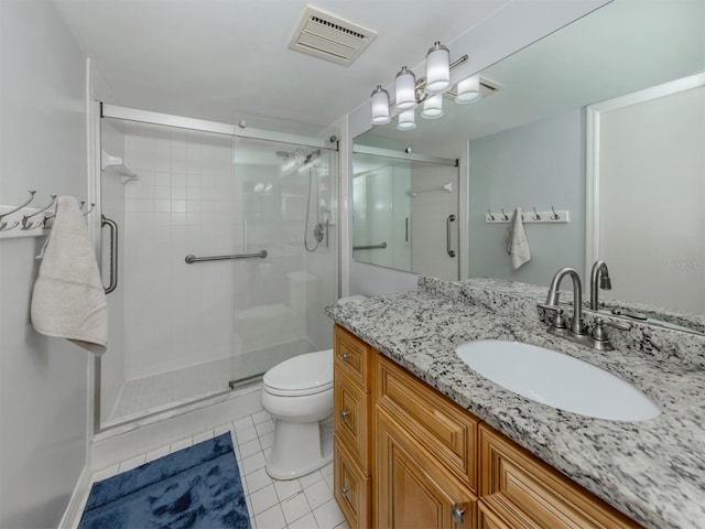 418 Cerromar Ct Unit 158, Venice, FL 34293 - full bath featuring vanity, tile patterned floors, a shower stall, and toilet