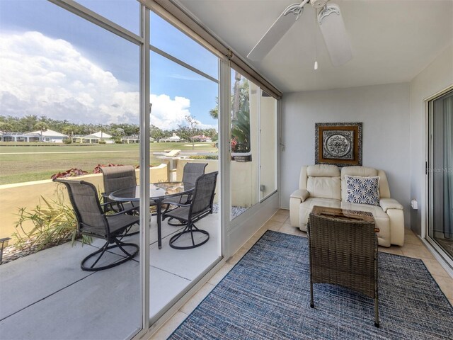 418 Cerromar Ct Unit 158, Venice, FL 34293 - sunroom / solarium featuring ceiling fan and outdoor dining space