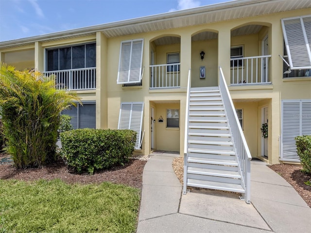 418 Cerromar Ct Unit 158, Venice, FL 34293 - entrance to property featuring stucco siding and a porch